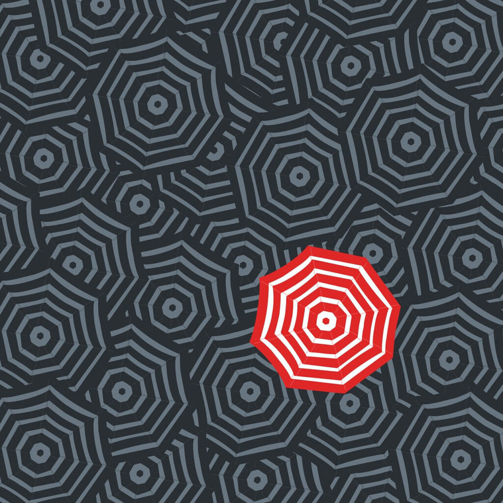 Illustration to represent programmatic targeting options. One umbrella is red while all others are grey.